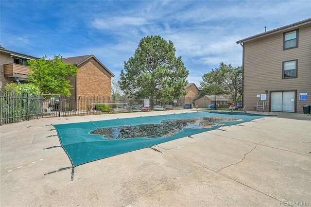 201 Wright St Unit 105, Lakewood, CO 80228 - community pool with a patio and a fenced backyard