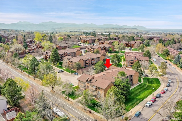 201 Wright St Unit 105, Lakewood, CO 80228 - aerial view of property's location featuring a mountainous background and nearby suburban area