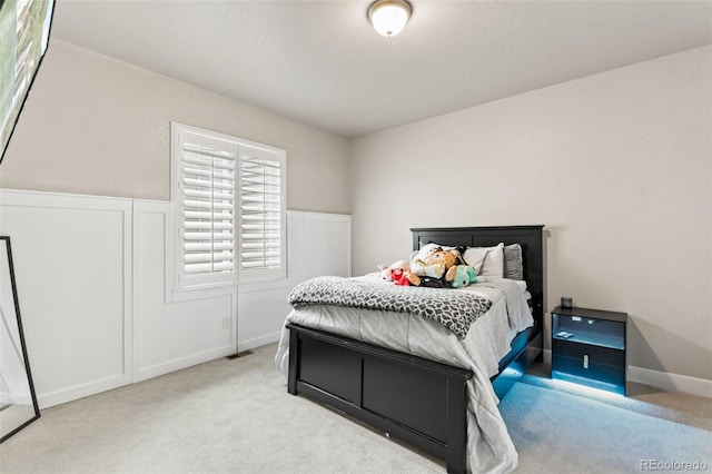 10080 E 160th Pl, Brighton, CO 80602 - carpeted bedroom with wainscoting