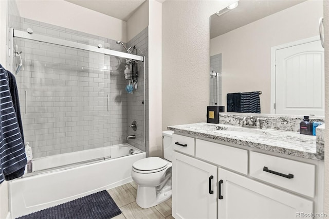 10080 E 160th Pl, Brighton, CO 80602 - full bath with vanity, toilet, and shower / bath combination with glass door