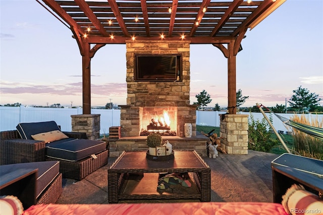 10080 E 160th Pl, Brighton, CO 80602 - view of patio / terrace featuring an outdoor stone fireplace and a pergola