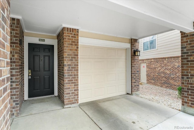 1631 Egret Way, Superior, CO 80027 - property entrance featuring brick siding and driveway