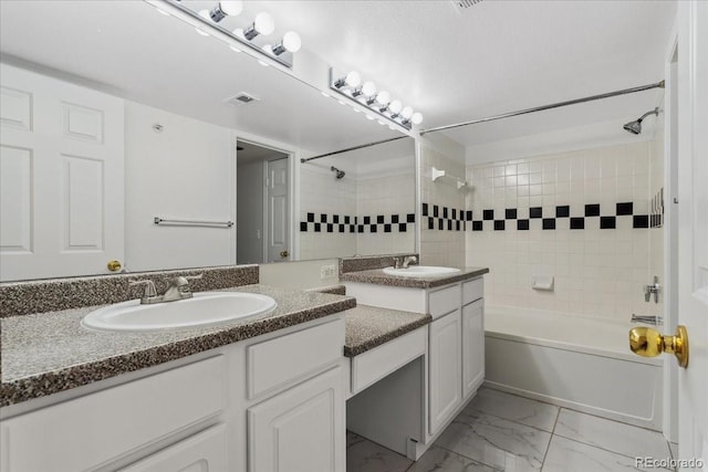 1631 Egret Way, Superior, CO 80027 - full bath featuring double vanity, shower / bathtub combination, and marble finish flooring