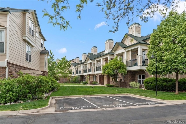 1631 Egret Way, Superior, CO 80027 - uncovered parking lot featuring a residential view