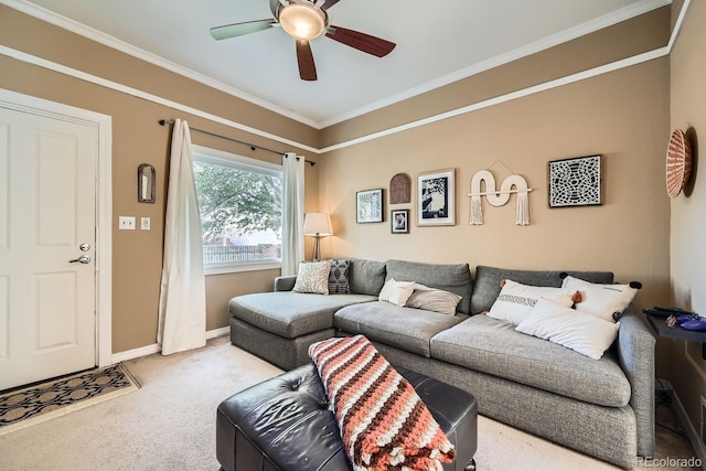 living room with light colored carpet, ornamental molding, and ceiling fan