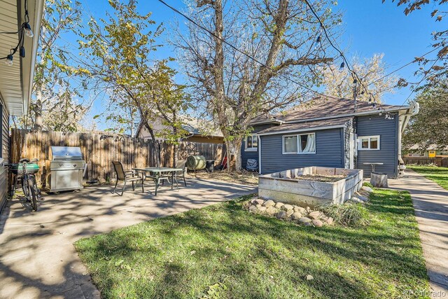 exterior space featuring a patio and a front lawn