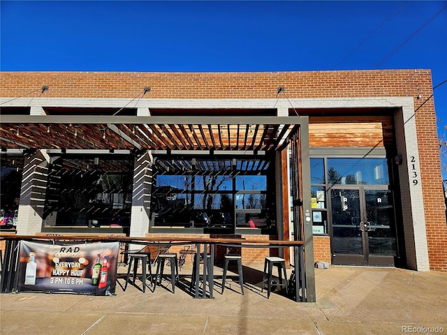 view of patio featuring french doors