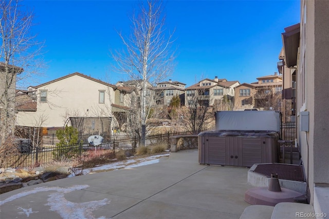 view of patio / terrace featuring a hot tub