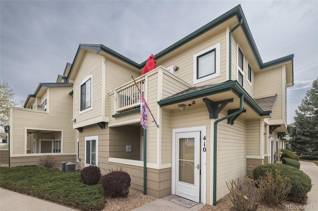 8707 E Florida Ave Unit 410, Denver, CO 80247 - view of front of property featuring cooling unit and a balcony