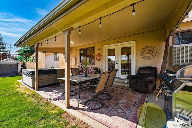 7314 W Walker Pl, Littleton, CO 80123 - view of patio / terrace featuring french doors, outdoor dining space, and a hot tub
