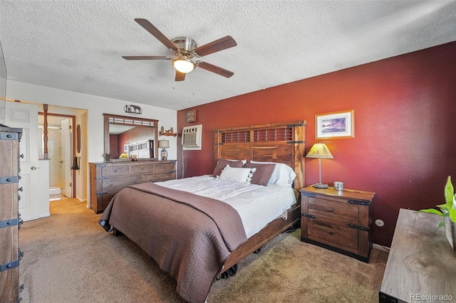 7314 W Walker Pl, Littleton, CO 80123 - carpeted bedroom featuring ensuite bath, a textured ceiling, and a ceiling fan