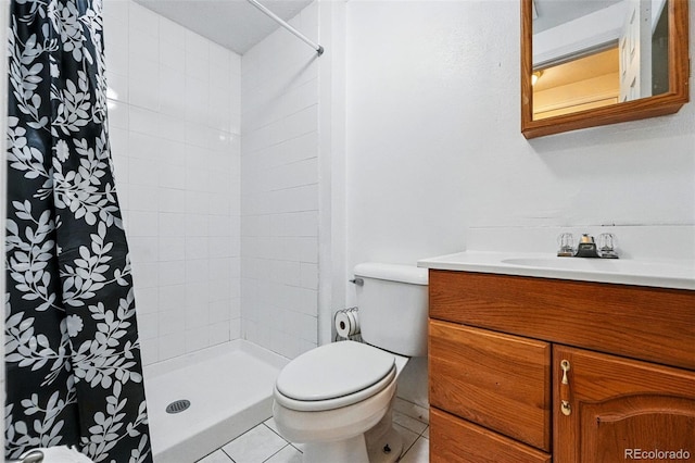 7314 W Walker Pl, Littleton, CO 80123 - bathroom with tile patterned flooring, toilet, a shower stall, and vanity