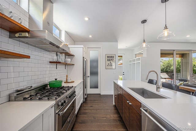 4180 Ames St, Denver, CO 80212 - kitchen featuring appliances with stainless steel finishes, open shelves, dark wood-type flooring, light countertops, and recessed lighting