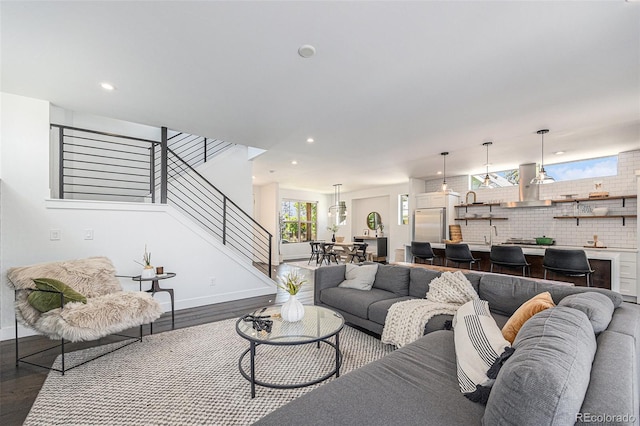 4180 Ames St, Denver, CO 80212 - living area featuring dark wood-style floors, stairs, and recessed lighting