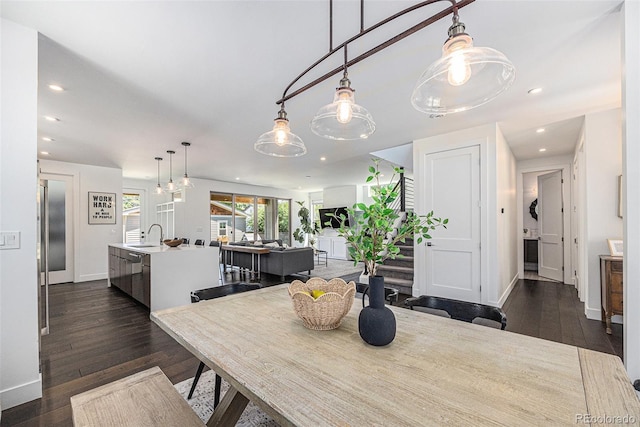 4180 Ames St, Denver, CO 80212 - dining space featuring dark wood-type flooring and recessed lighting