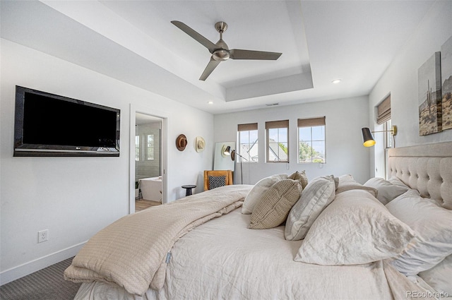 4180 Ames St, Denver, CO 80212 - bedroom with recessed lighting, a tray ceiling, connected bathroom, ceiling fan, and carpet flooring