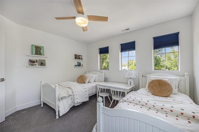 4180 Ames St, Denver, CO 80212 - carpeted bedroom with baseboards and ceiling fan