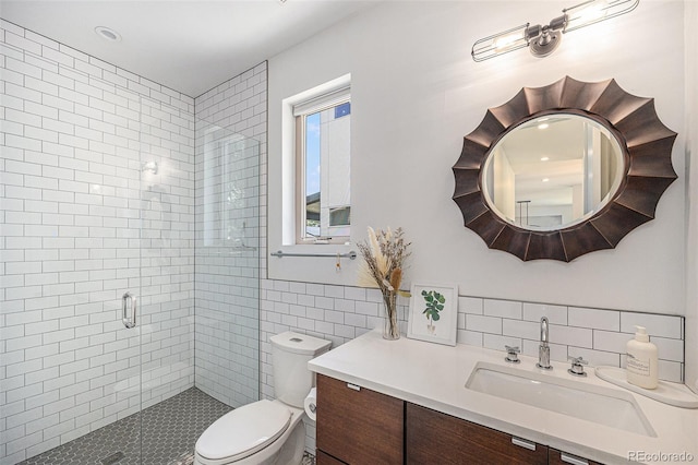 4180 Ames St, Denver, CO 80212 - full bath with tile walls, a shower stall, and vanity