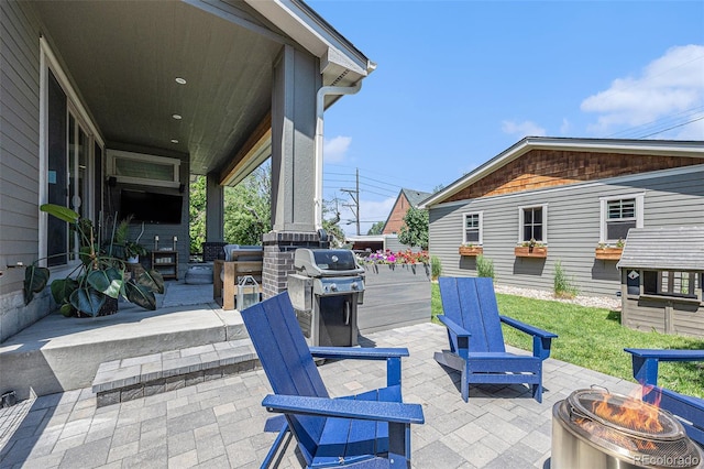 4180 Ames St, Denver, CO 80212 - view of patio / terrace featuring a fire pit and a grill