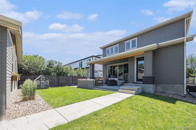 4180 Ames St, Denver, CO 80212 - fenced backyard with an outdoor living space, a patio, and a storage shed