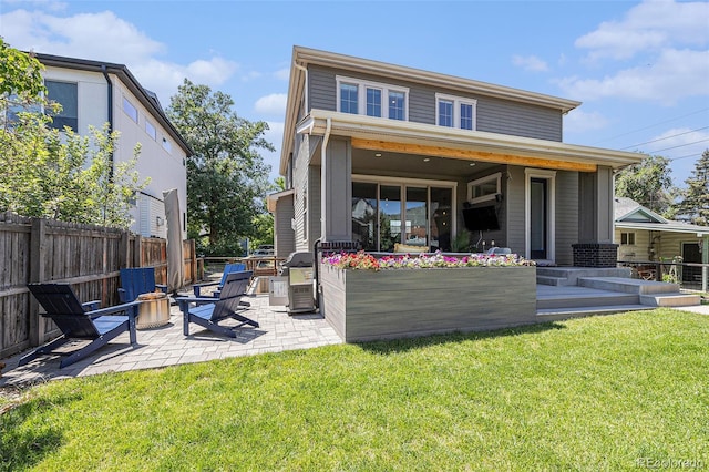 4180 Ames St, Denver, CO 80212 - back of house with a patio area and an outdoor fire pit