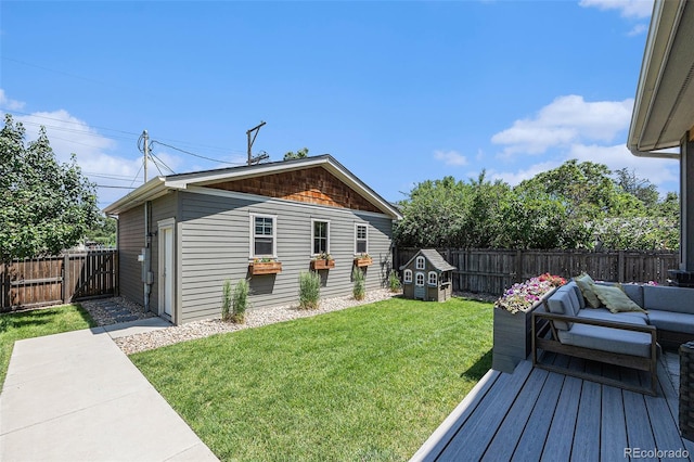 4180 Ames St, Denver, CO 80212 - fenced backyard featuring outdoor lounge area and an outbuilding