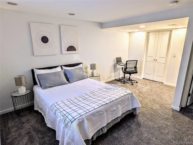 carpeted bedroom featuring a closet