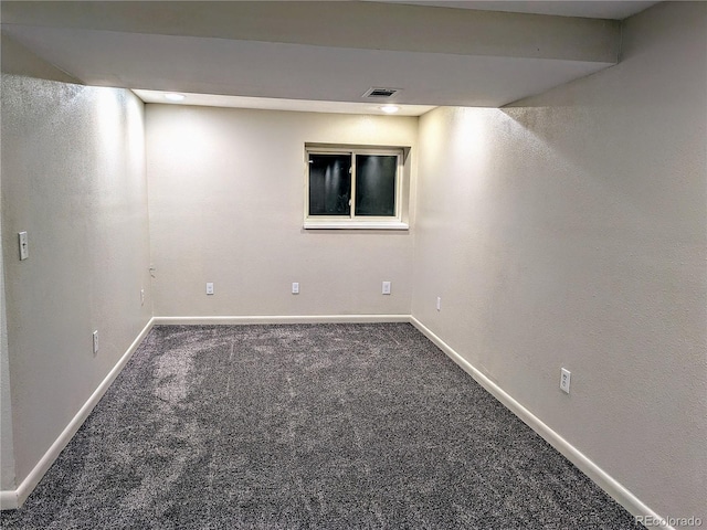 basement featuring carpet flooring