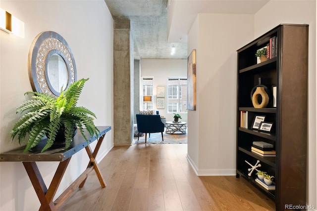 hall with light hardwood / wood-style flooring