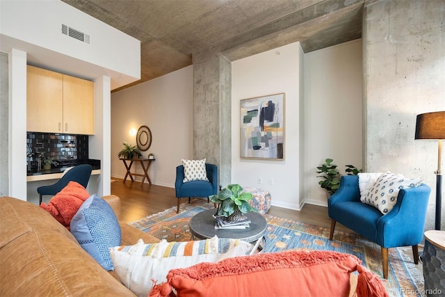 living room with dark hardwood / wood-style floors