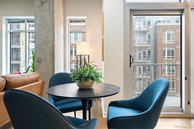 dining space featuring light wood-type flooring