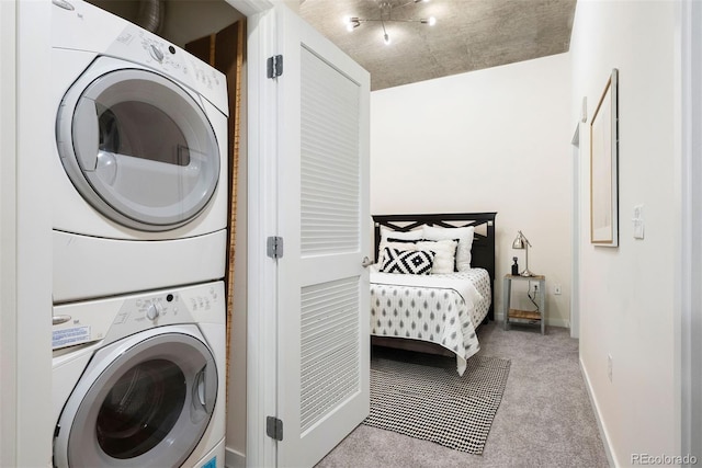 laundry room with stacked washing maching and dryer and light colored carpet