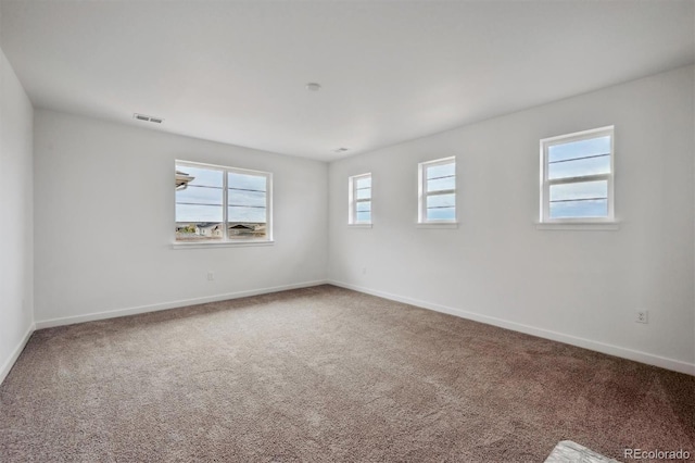 24708 E 40th Ave, Aurora, CO 80019 - carpeted empty room with baseboards