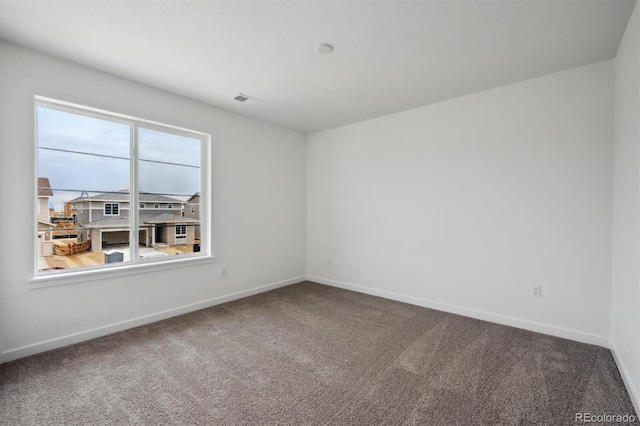 24708 E 40th Ave, Aurora, CO 80019 - carpeted empty room with baseboards