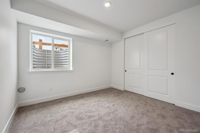 24708 E 40th Ave, Aurora, CO 80019 - unfurnished bedroom with carpet, baseboards, and a closet