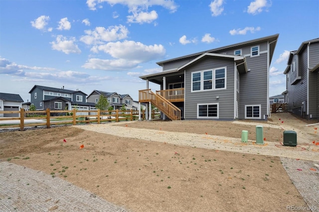 24708 E 40th Ave, Aurora, CO 80019 - back of property with stairs and a residential view