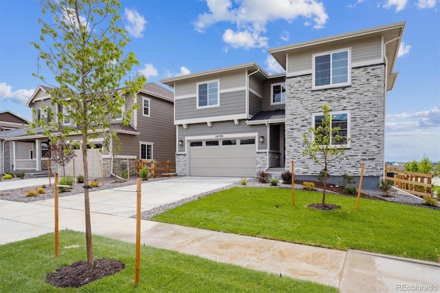 24708 E 40th Ave, Aurora, CO 80019 - view of front of property with stone siding, driveway, and an attached garage