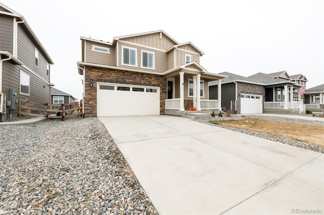 craftsman house with a garage and a porch