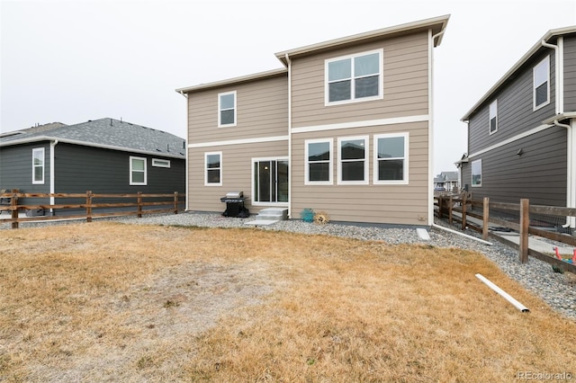 833 Vixen Dr, Fort Collins, CO 80524 - rear view of property featuring a yard