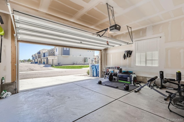 garage featuring a garage door opener