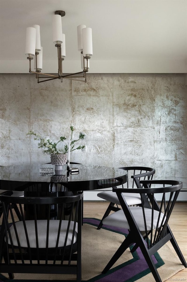 unfurnished dining area with wood finished floors