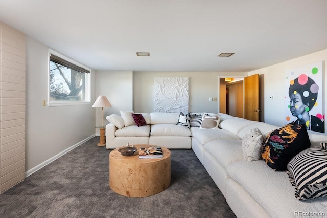 carpeted living room featuring visible vents and baseboards