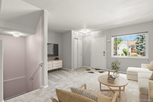 4574 S Cimmarron Cir Unit B, Aurora, CO 80015 - carpeted living room with baseboards