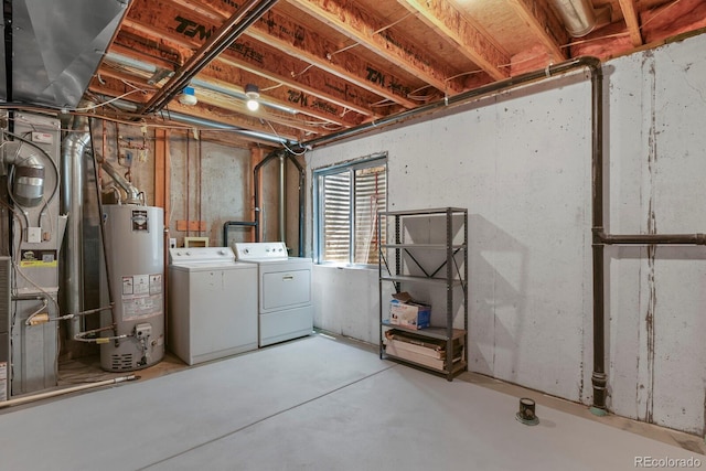 4574 S Cimmarron Cir Unit B, Aurora, CO 80015 - below grade area featuring gas water heater, washing machine and clothes dryer, and heating unit