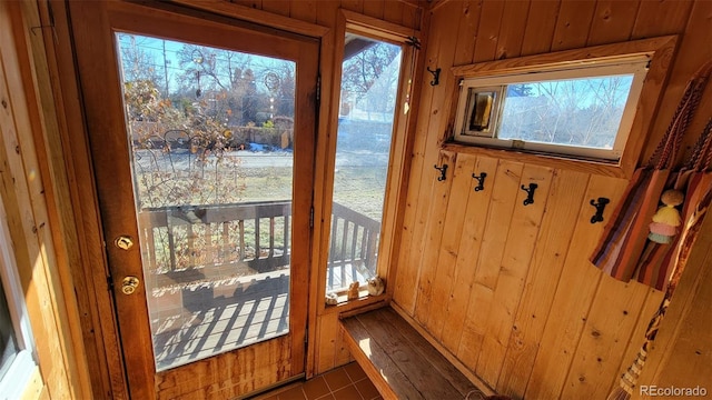 8211 Rocky Mountain Dr, Lakewood, CO 80214 - doorway with wooden walls and tile patterned floors