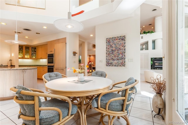 400 S Steele St Unit 13, Denver, CO 80209 - dining room with light tile patterned floors and recessed lighting