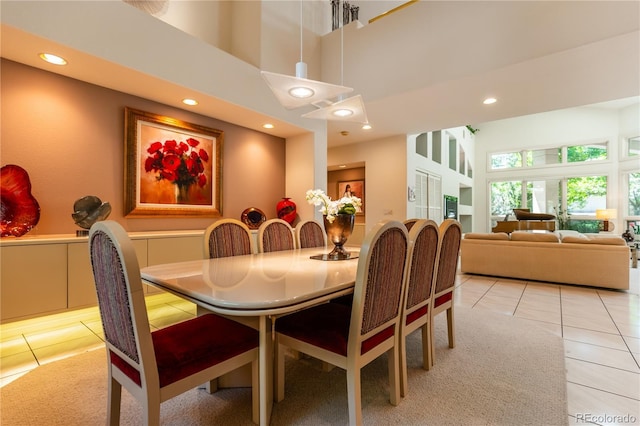 400 S Steele St Unit 13, Denver, CO 80209 - dining room with light tile patterned floors, recessed lighting, and a high ceiling