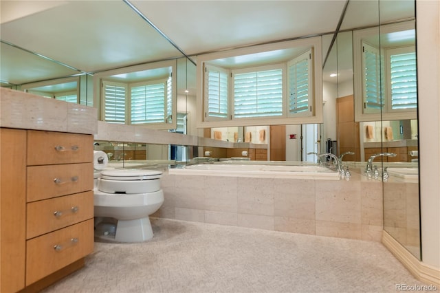 400 S Steele St Unit 13, Denver, CO 80209 - full bathroom featuring toilet and a relaxing tiled tub