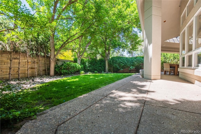 400 S Steele St Unit 13, Denver, CO 80209 - fenced backyard featuring a patio area