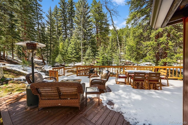 27802 Shadow Mountain Dr, Conifer, CO 80433 - wooden terrace featuring an outdoor hangout area and outdoor dining space